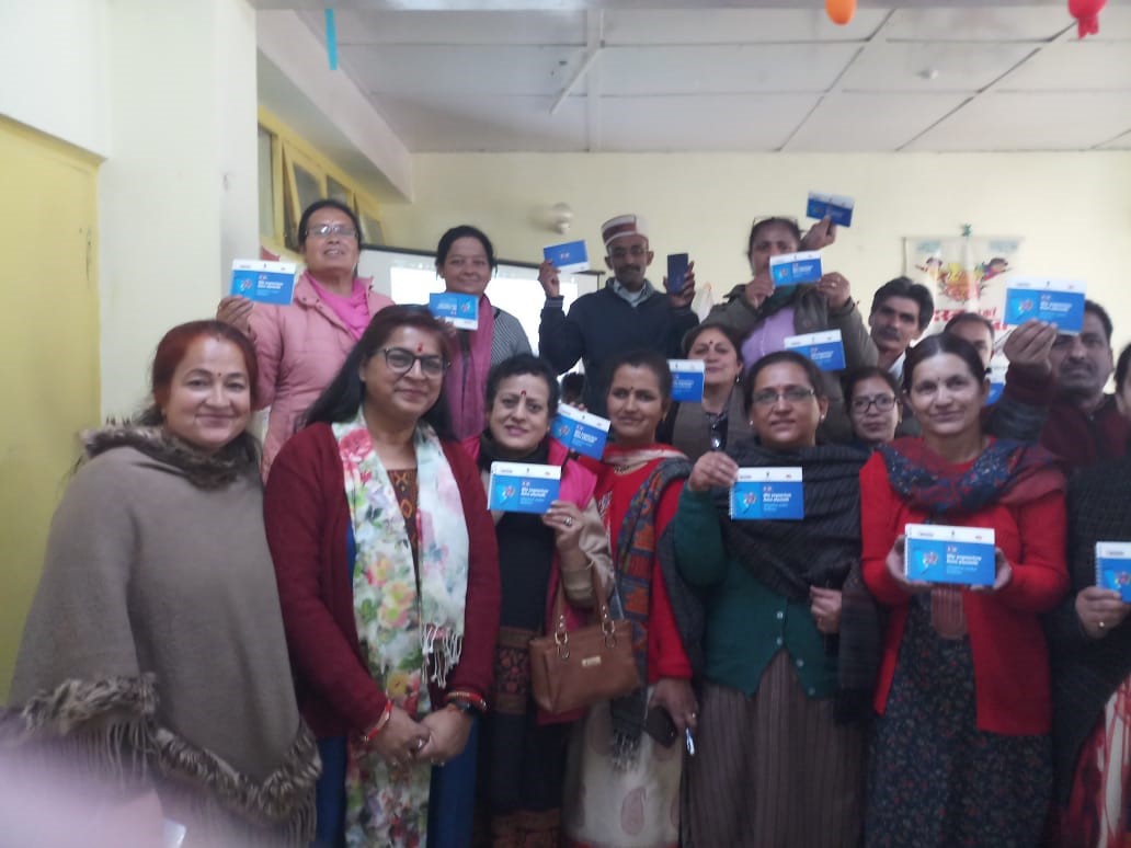 Ms. Seema Kaushal, TM, RVVI  with the participants (showing user manual of RISE App)  after the orientation session at Shimla, HP
